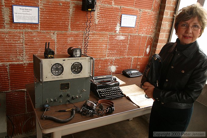 Mary with vintage meterological and radio gear