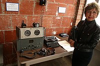 Mary with vintage meterological and radio gear