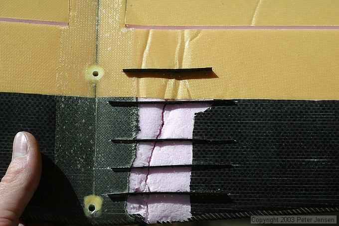 carbon laminate strips slid in place to repair XP-3 wing that folded completely over