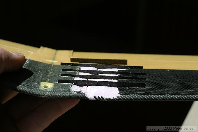 carbon laminate strips slid in place to repair XP-3 wing that folded completely over