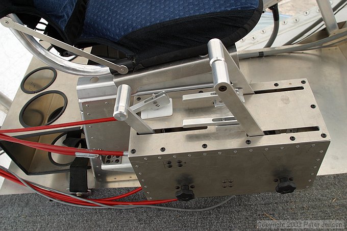 motor controls; rear thruster on left, side thrusters in front.  small levers are chokes