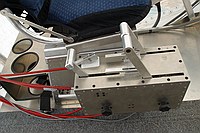 motor controls; rear thruster on left, side thrusters in front.  small levers are chokes