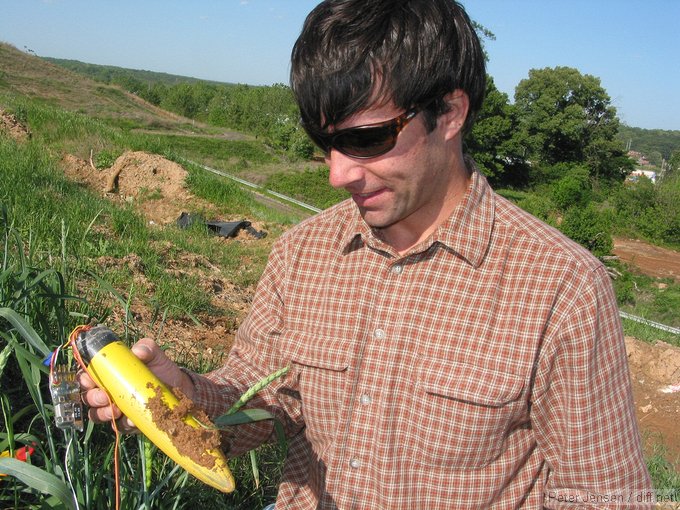 Spencer holding the unearthed nose cone