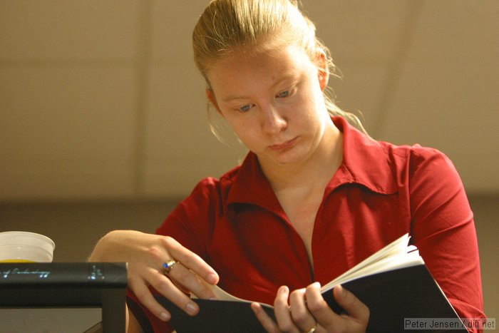 Jess reading the graduation program