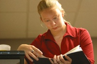 Jess reading the graduation program