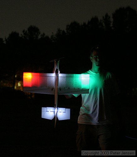 Peter with his Funplanes Edge 540.  Two red and two green LEDs inside the wing, one each white LEDs in the keel and tail.