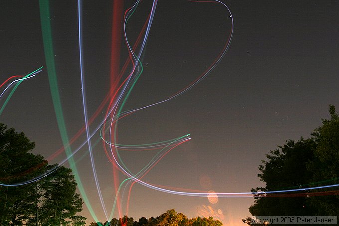 skywriting with the Funplanes Edge 540 foamie and some LEDs.  Charles Frey took the pictures.