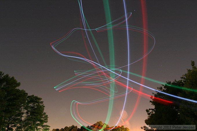 skywriting with the Funplanes Edge 540 foamie and some LEDs.  Charles Frey took the pictures.