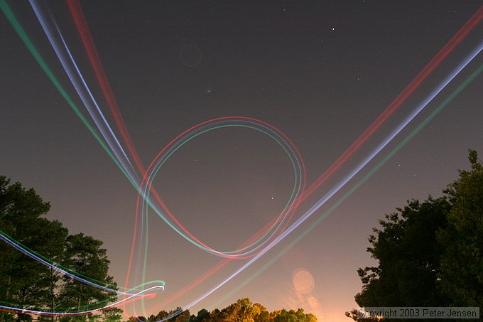 skywriting with the Funplanes Edge 540 foamie and some LEDs.  Charles Frey took the pictures.