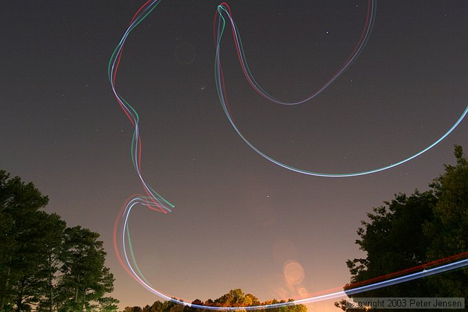 skywriting with the Funplanes Edge 540 foamie and some LEDs.  Charles Frey took the pictures.