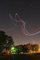 skywriting with the Funplanes Edge 540 foamie and some LEDs.  Charles Frey took the pictures.