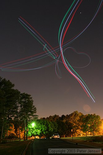 skywriting with the Funplanes Edge 540 foamie and some LEDs.  Charles Frey took the pictures.