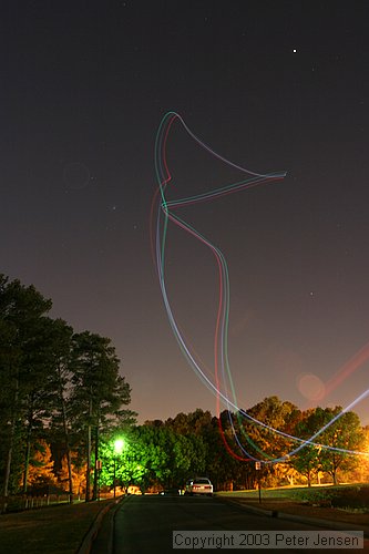 skywriting with the Funplanes Edge 540 foamie and some LEDs.  Charles Frey took the pictures.