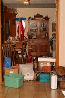 what happens to an otherwise nice dining room (note: several airplanes, glue all over family heirloom table, server farm on the right, and cat5 cable dangling from ceiling)