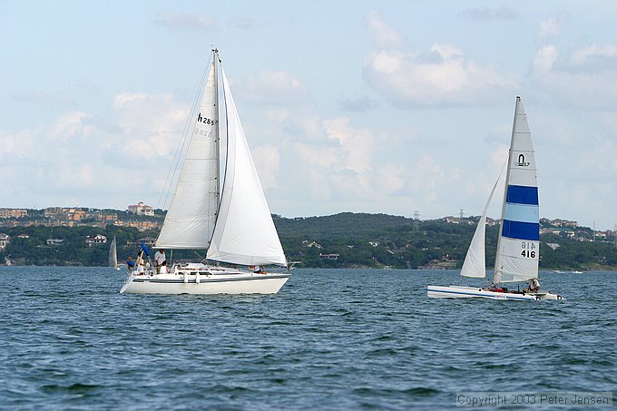Hunter 28.5 meets Nacra 5.7 with Wasabi (an 11m One Design) far out