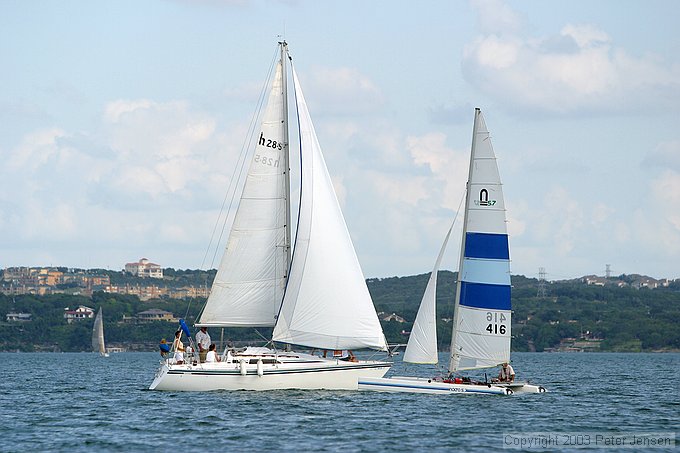 Hunter 28.5 meets Nacra 5.7 with Wasabi (an 11m One Design) far out