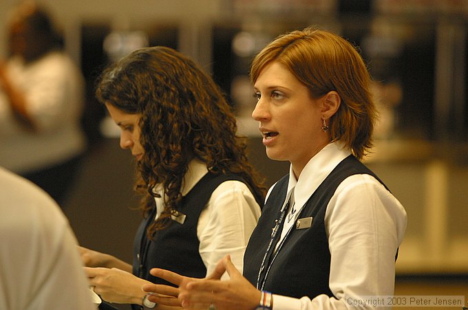 American Eagle employee trying to comfort frustrated customers