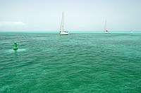 boats entering the semi-marked channel (note the really shallow spots off in the distance past the channel)