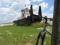 we ate  lunch at a campsite with this old towboat