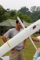 Charles after being schooled in the fine art of having your picture taken with a plane by Gordy