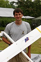 Charles after being schooled in the fine art of having your picture taken with a plane by Gordy