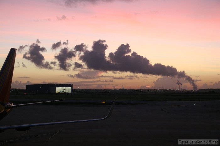 condensation from the cooling towers at OUC's Curtis Stanton power plant, a few miles to the NE