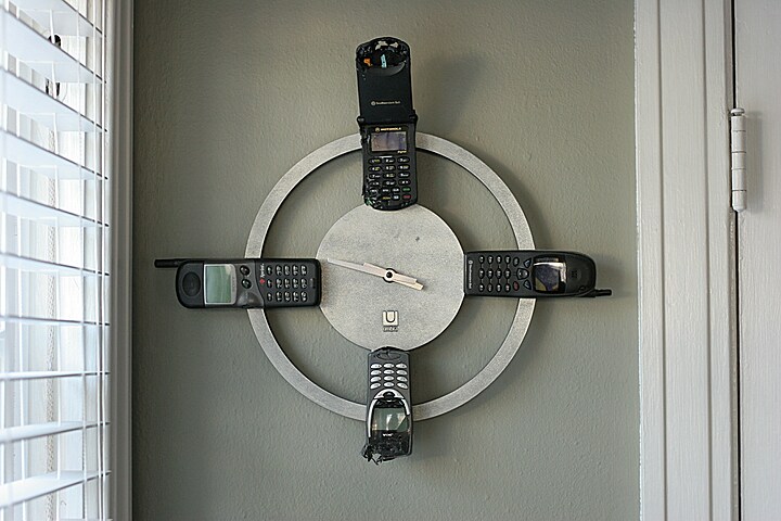 a clock made of cell phones Stella has destroyed