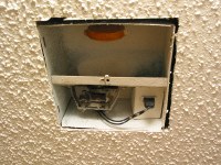 fan and urinal cake in the ceiling