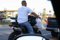 this is a bad idea on a bicycle -- I wonder what that swinging weight would do on a motorcycle if you had to dodge something?