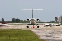this plane probably costs more than everything on this half of the airport, including the airport