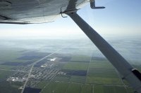 low-lying smoke from brush fires