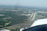 southwest-bound along I-4 with the white water tower (listed as orange in the NOTAM)