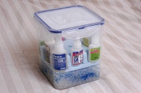 the sealed container, with silica gel and some blue-when-dry pink-when-full markers