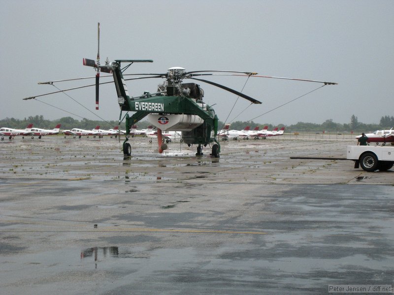 Evergreen Aviation Sikorsky S-64 with FIT's fleet of Warriors in the background at MLB