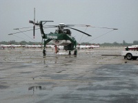 Evergreen Aviation Sikorsky S-64 with FIT's fleet of Warriors in the background at MLB