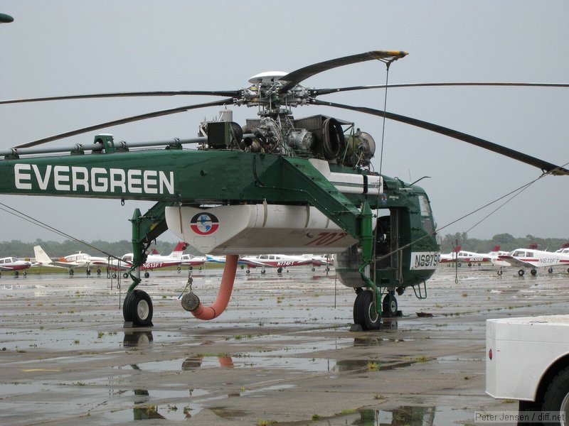 Evergreen Aviation Sikorsky S-64 with FIT's fleet of Warriors in the background at MLB