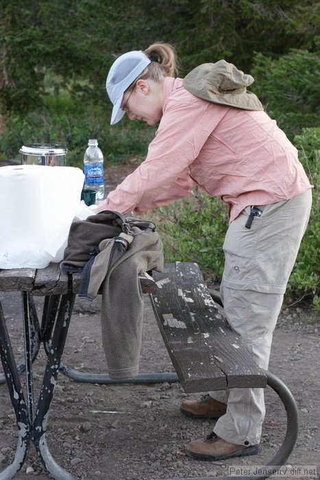 two hats are better than one - the blue one retains hair, but the tan one has built-in insect repellant