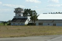 in disrepair, but the house has a control tower.  How could you go wrong?