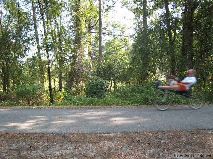 guy on a recumbent cruising by