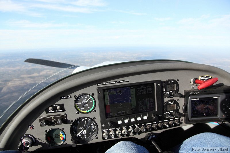 N17UA panel -  roughtly L-R, ignition (off with prop feathered), audio panel, varios, airspeed, altimeter, glass panel, throttle, radio, transponder, emergency parachute, Garmin 496