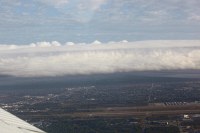 looking north over MLB as the front rolls in