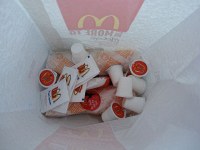 McWTF!\nI'm pretty sure I said either "yes", or "yes ma'm" when she asked me if I wanted cream and sugar with my 16oz coffee. That's 9 (NINE) creamers and six sugar packets for my drive-through order.