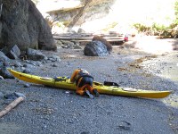 David working the foot-pegs on Laura's Necky Chatham 17