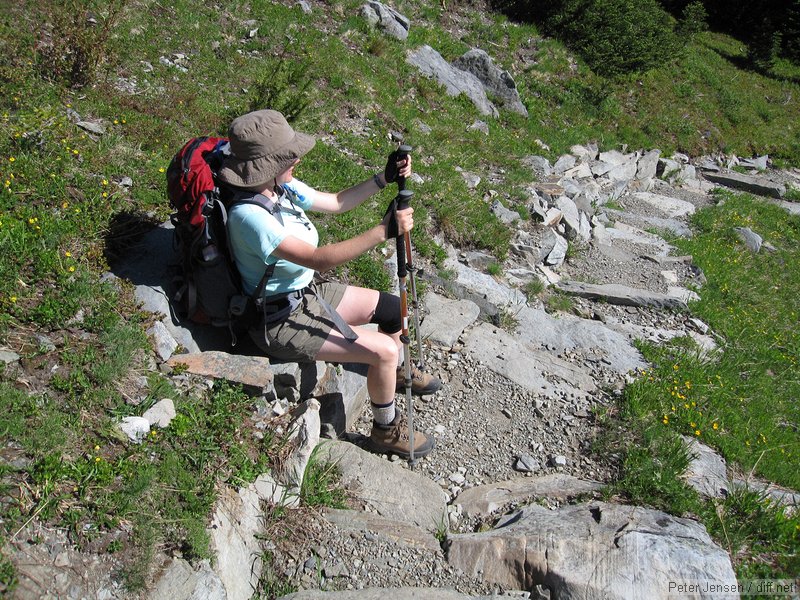 enjoying a sit on one of the curious seat/water diversion features on the trail between Moose and Gladys