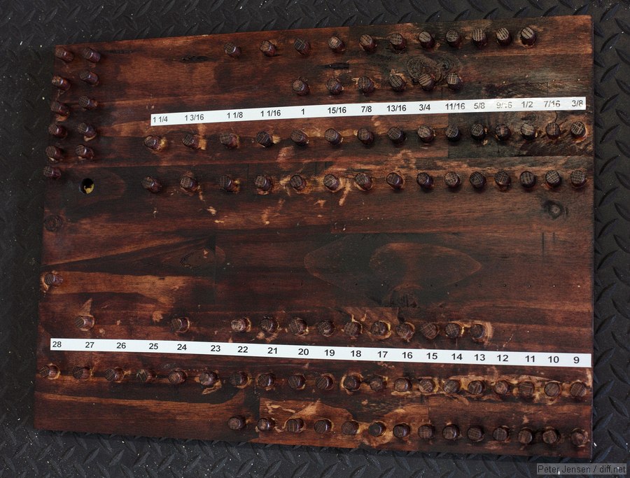 finished 1/2" socket board - pegs are 1/2" hardwood dowel, and ugliness is because I was lazy with the glue. Better approach would have been to stain the board first.