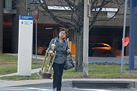 just your standard woman walking down the street with a giant trophy