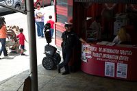 It's hard to look like a badass standing next to a segway, but this guy is trying.