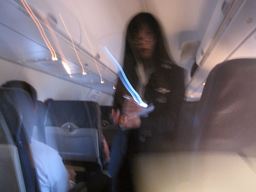cool southwest flight attendant with a dollar-store LED lit pen