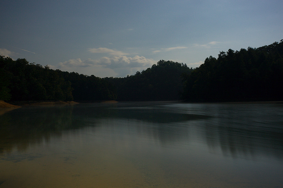 Perseids meteor caught by 30 second exposure from the boat ramp at Tsali campground, 35.43203, -83.65929. Light layer of fog drifting on the water.