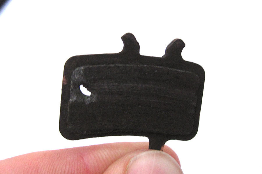 brake pad that had the spring get caught and eat through